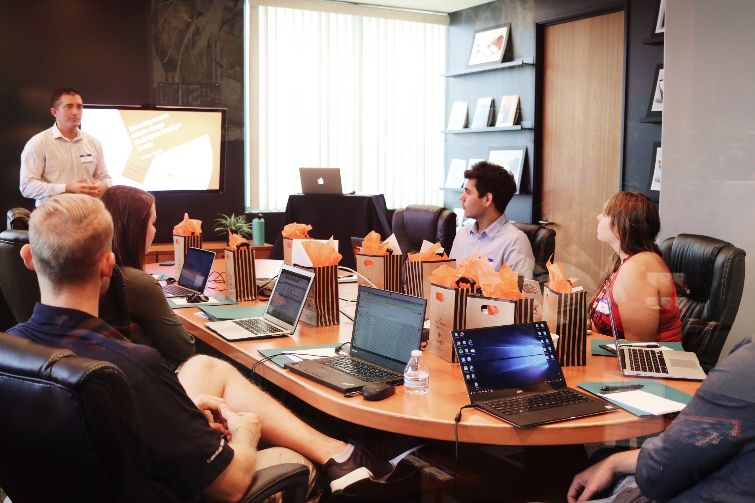 Photo of team meeting in the workplace.